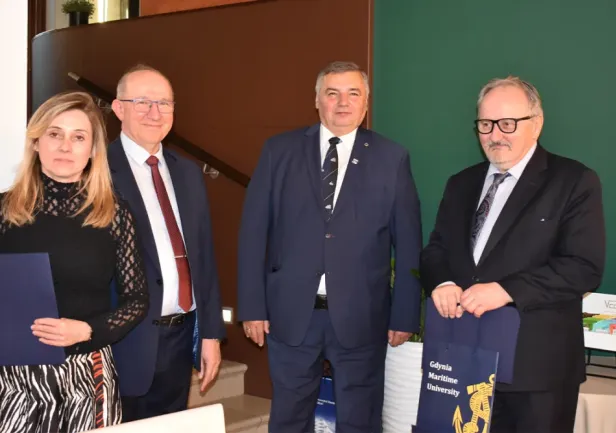 The official part of the gala dinner. From left to right: Deputy Chair of the Organising Committee, Associate Professor Kalina Detka; Chair of the Organising Committee, Professor Krzysztof G&oacute;recki; Rector of Gdynia Maritime University, Professor Adam Weintrit; and Chair of the Committee on Metrology and Scientific Instrumentation of the Polish Academy of Sciences, Professor Andrzej Zając (Photo: Dr Ewa Krac)